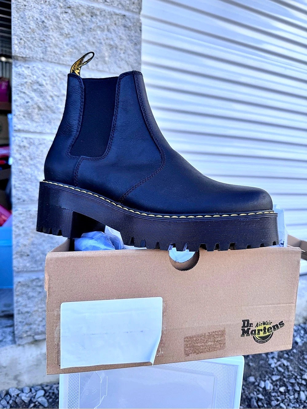 Dr. Martens Rometty Platform Chelsea Boots, highlighted by their signature yell